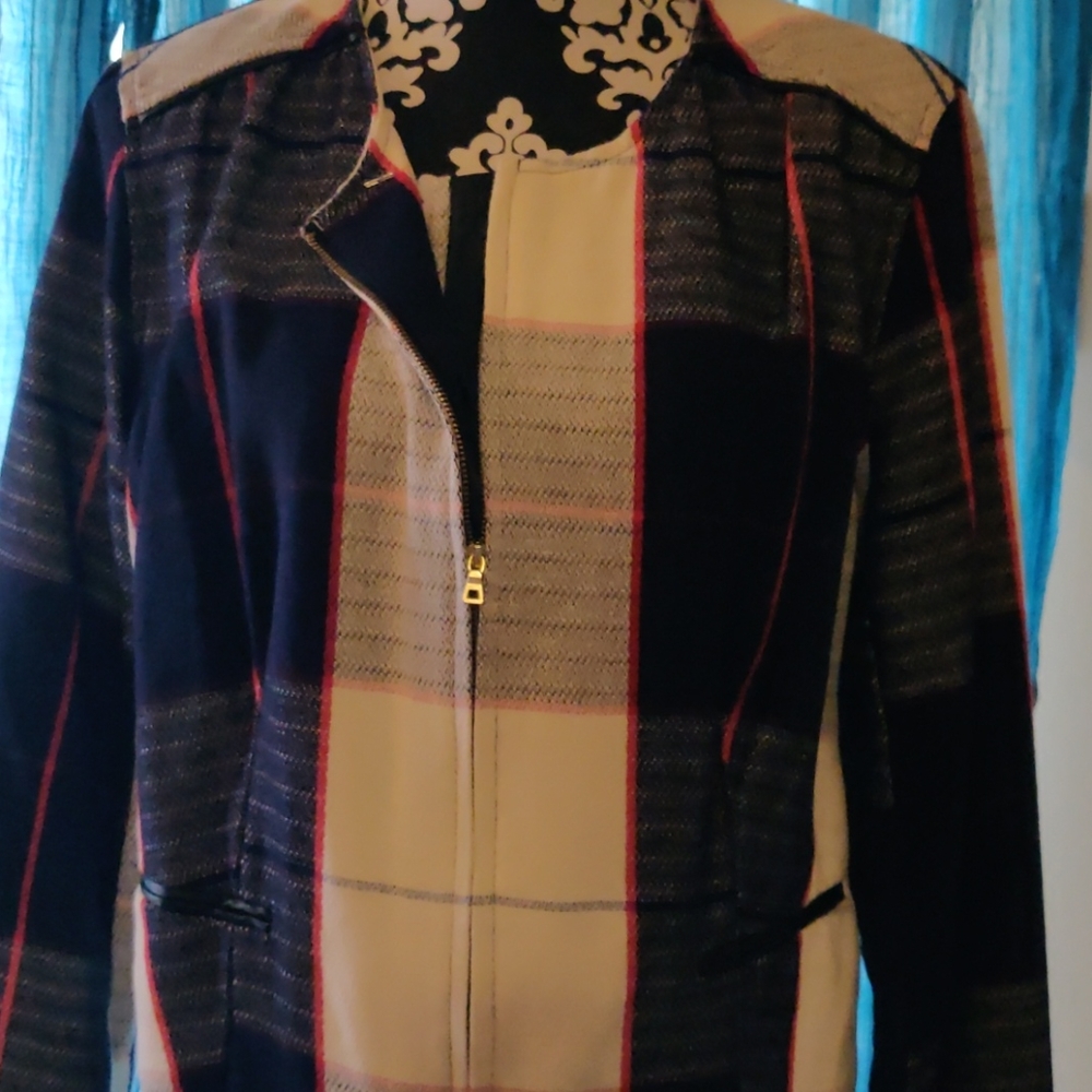 A red navy blue and cream plaid wool-like jacket